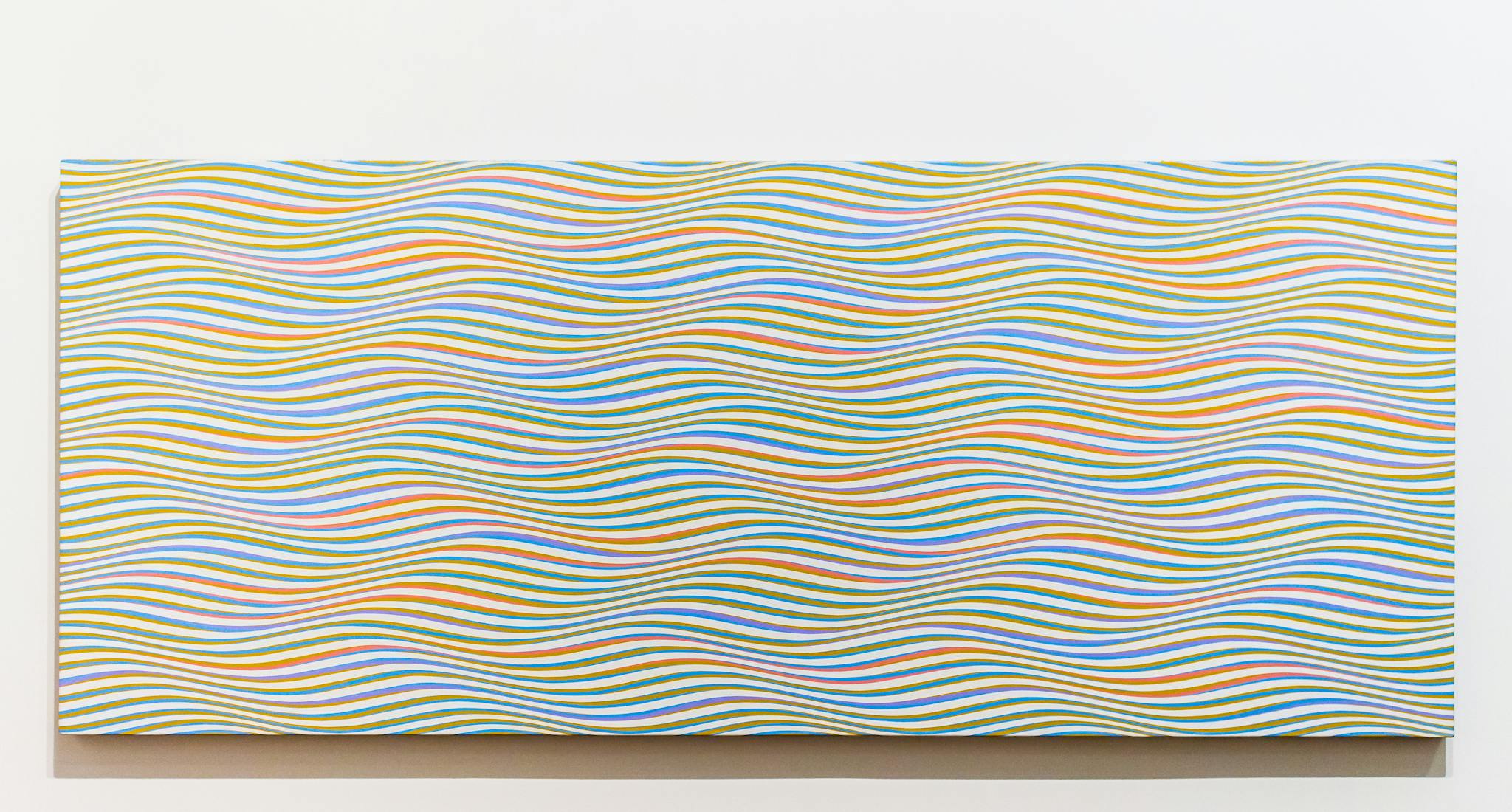 Colorful abstract wave pattern painting on a wall, perfect decor piece.
